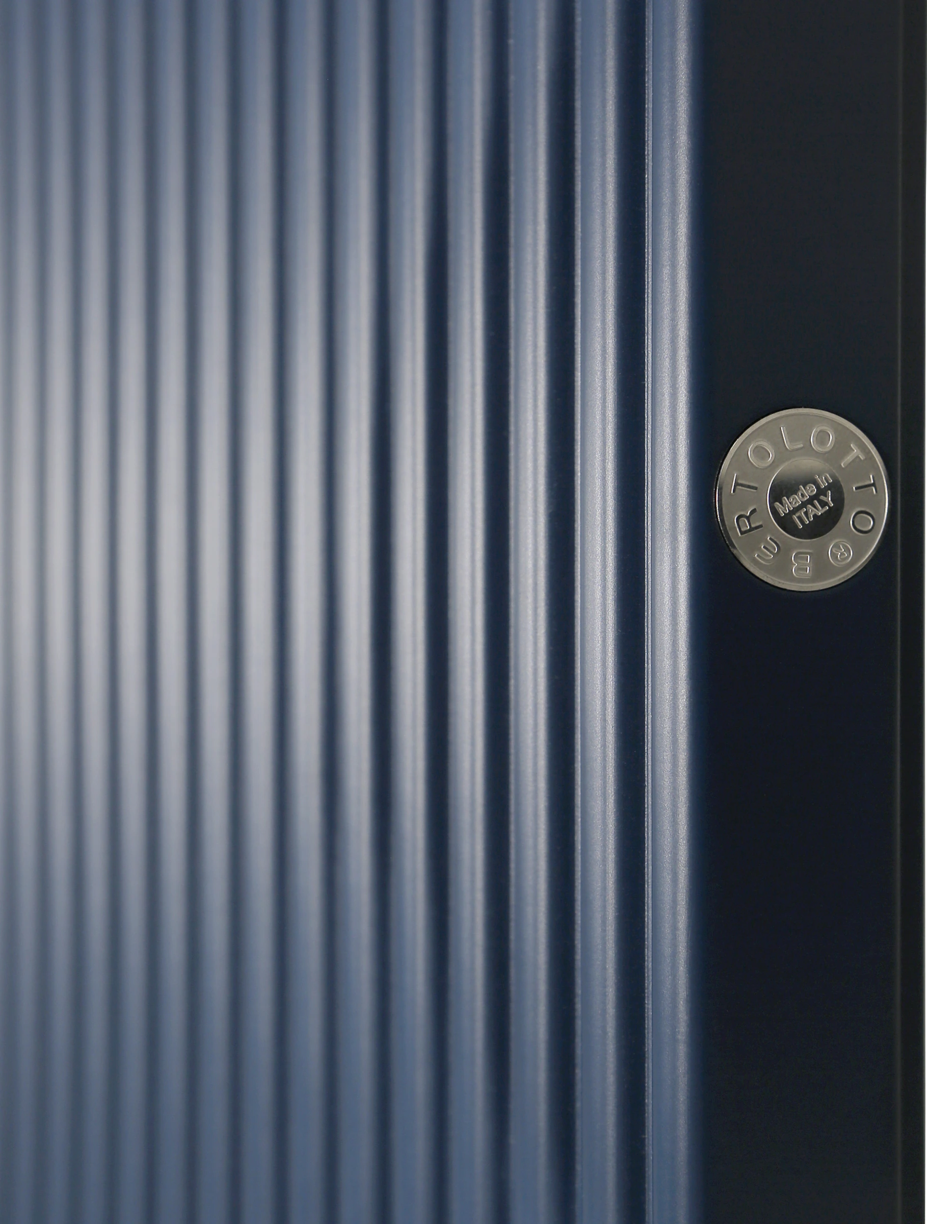 Bertolotto Millerighe: blue grooved door edge and badge
