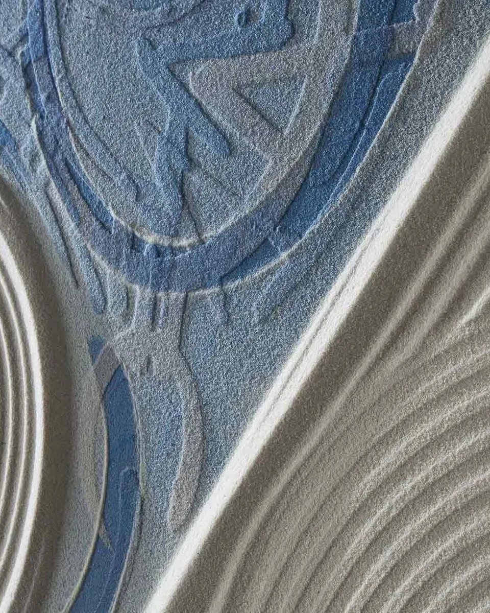 Close detail of the sculpted, sand-textured surface of a Casa Zen door.